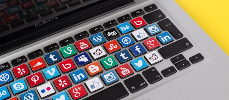 Social Media Logos on Macbook Keyboard